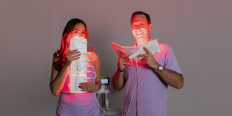 Brooke and Jeff McKeever educating on precision PBM technology at Light Academy in Newport Beach.